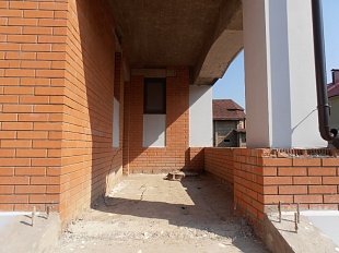 Проект двухэтажного дома из кирпича с гаражом и камином.Вид 12.